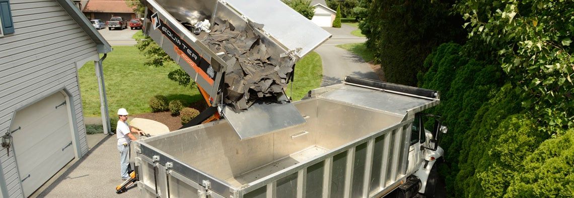 Hauling Roofing Debris: How to Make Job Site Cleanup Easy