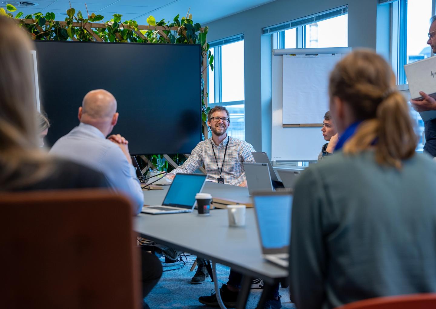 Employees at Fremtind in meeting